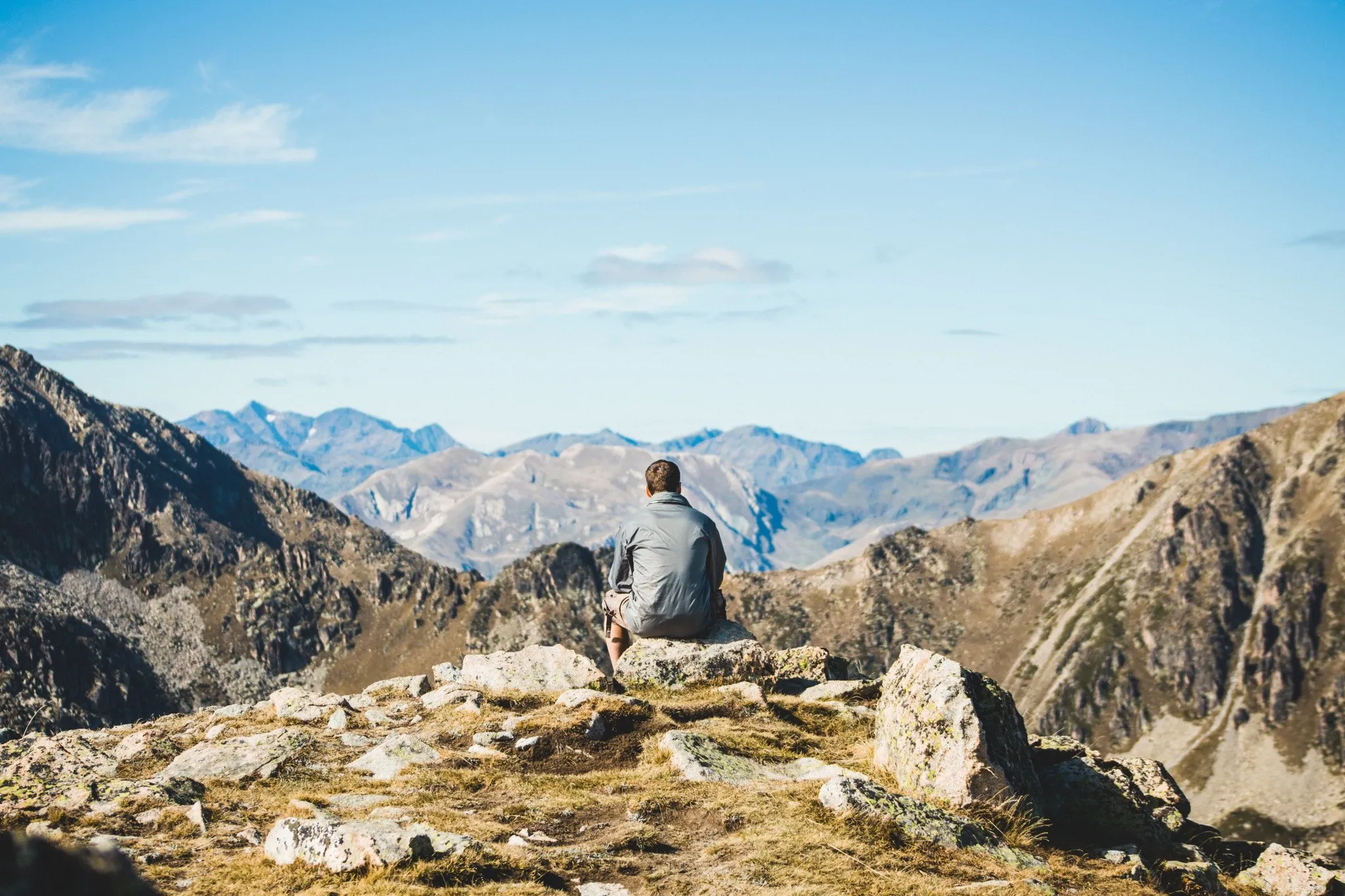 Hiker resting on a mountain